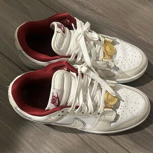 Nike White Sneakers with Red Lining and Gold Details